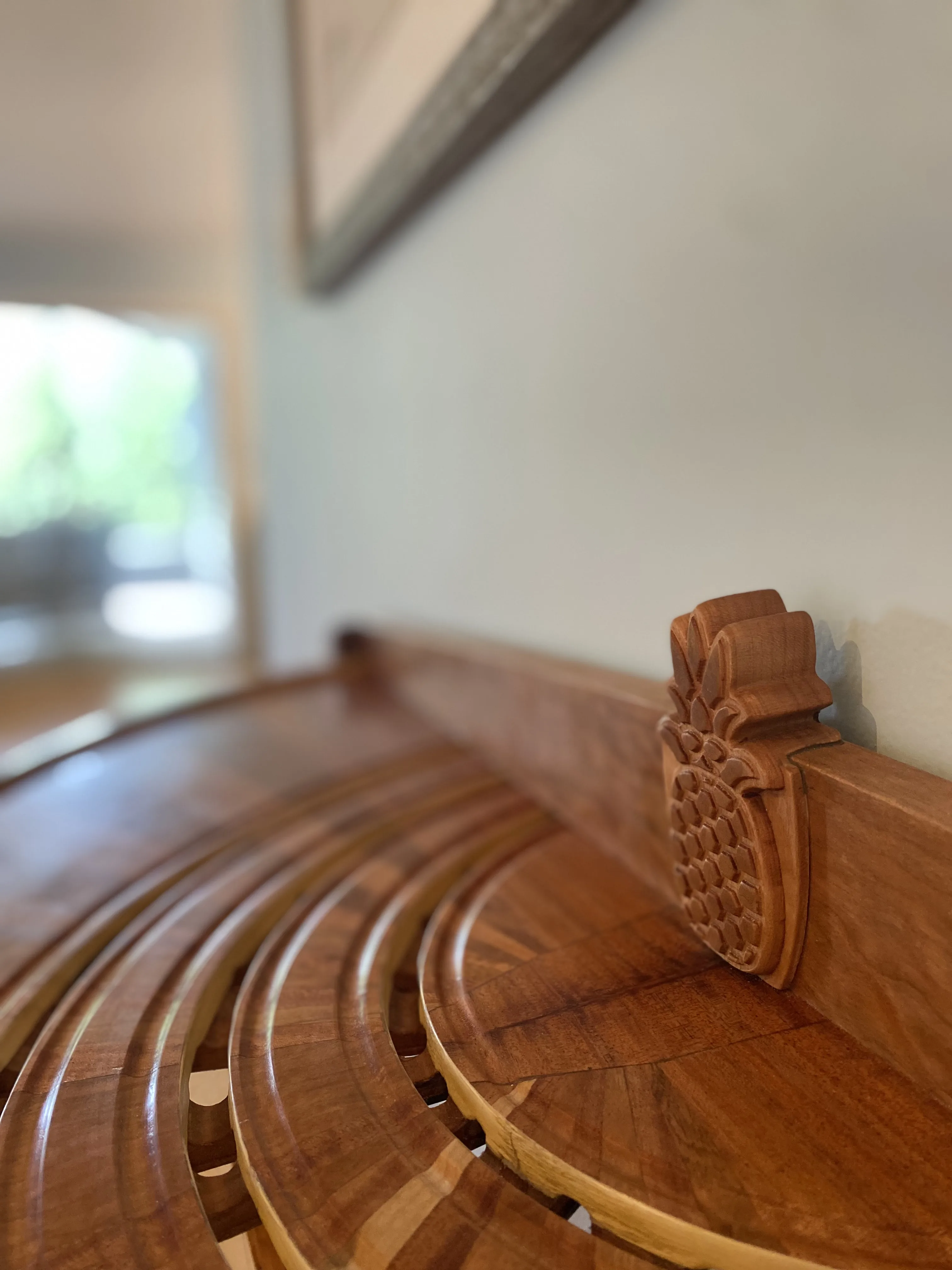 Pineapple finial on the cherry demilune