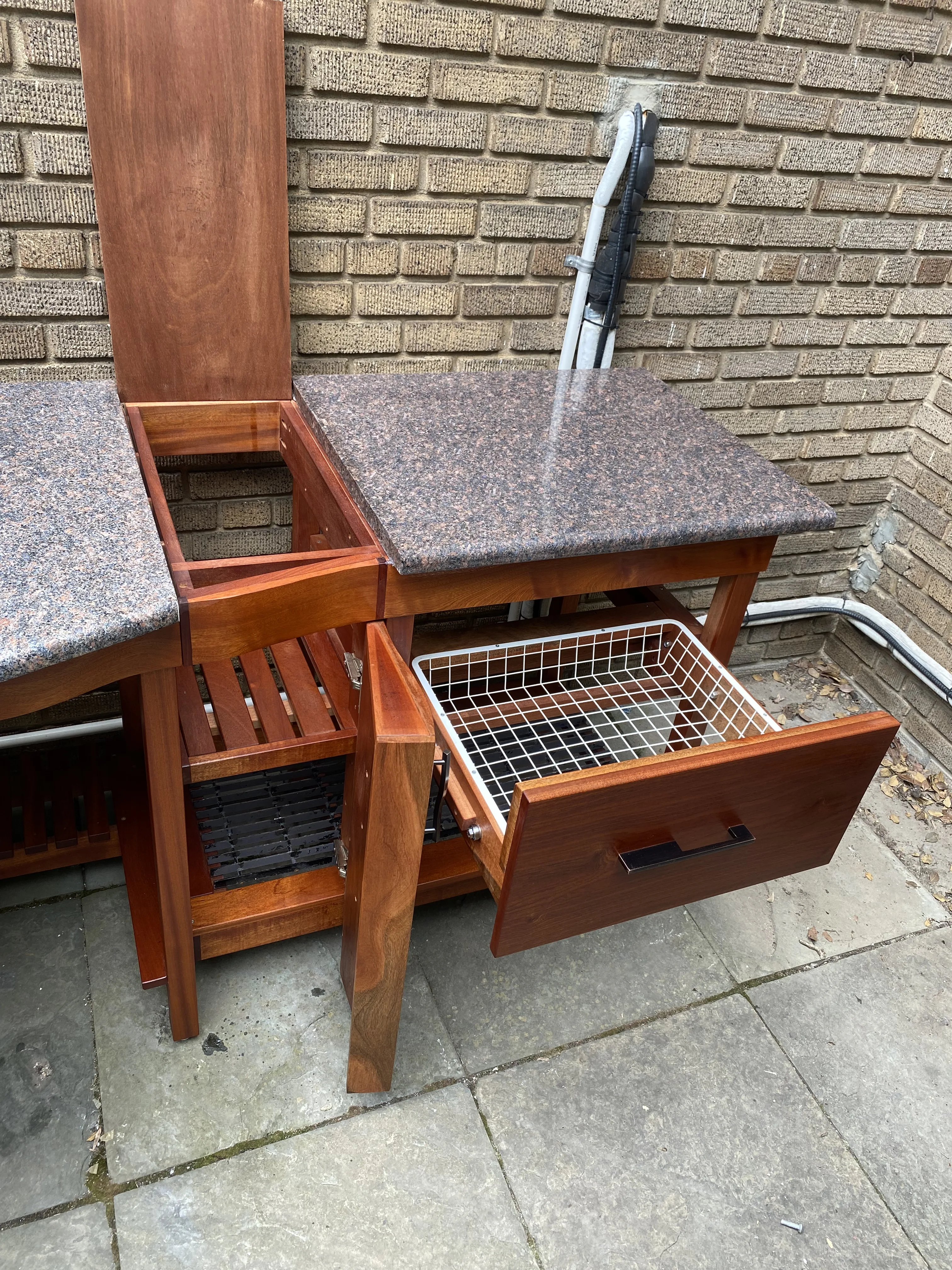 Sapele grill surround with a reclaimed marble top, Cathedral Heights