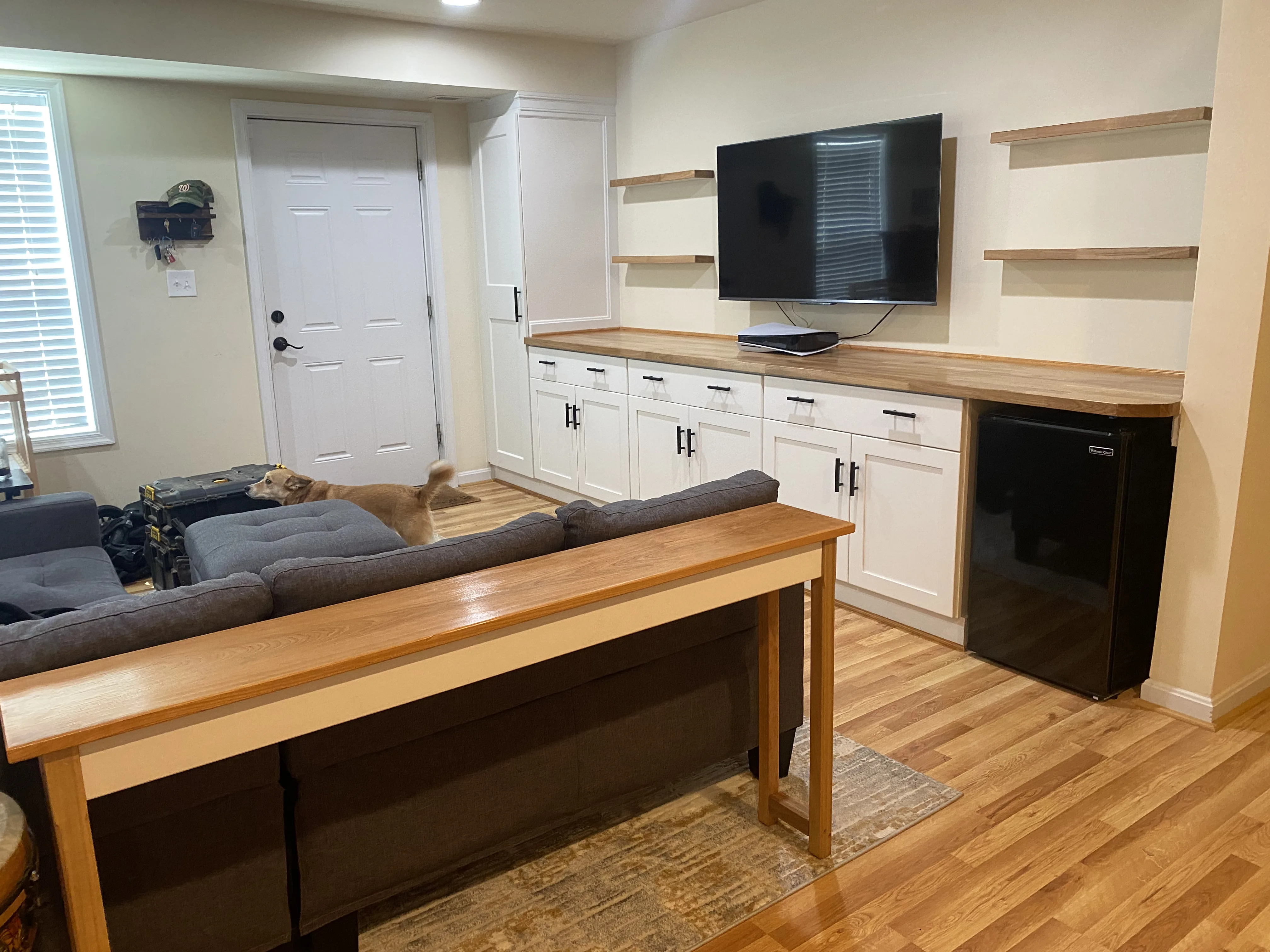 Rec room run with sofa-back table, Southwest DC residence