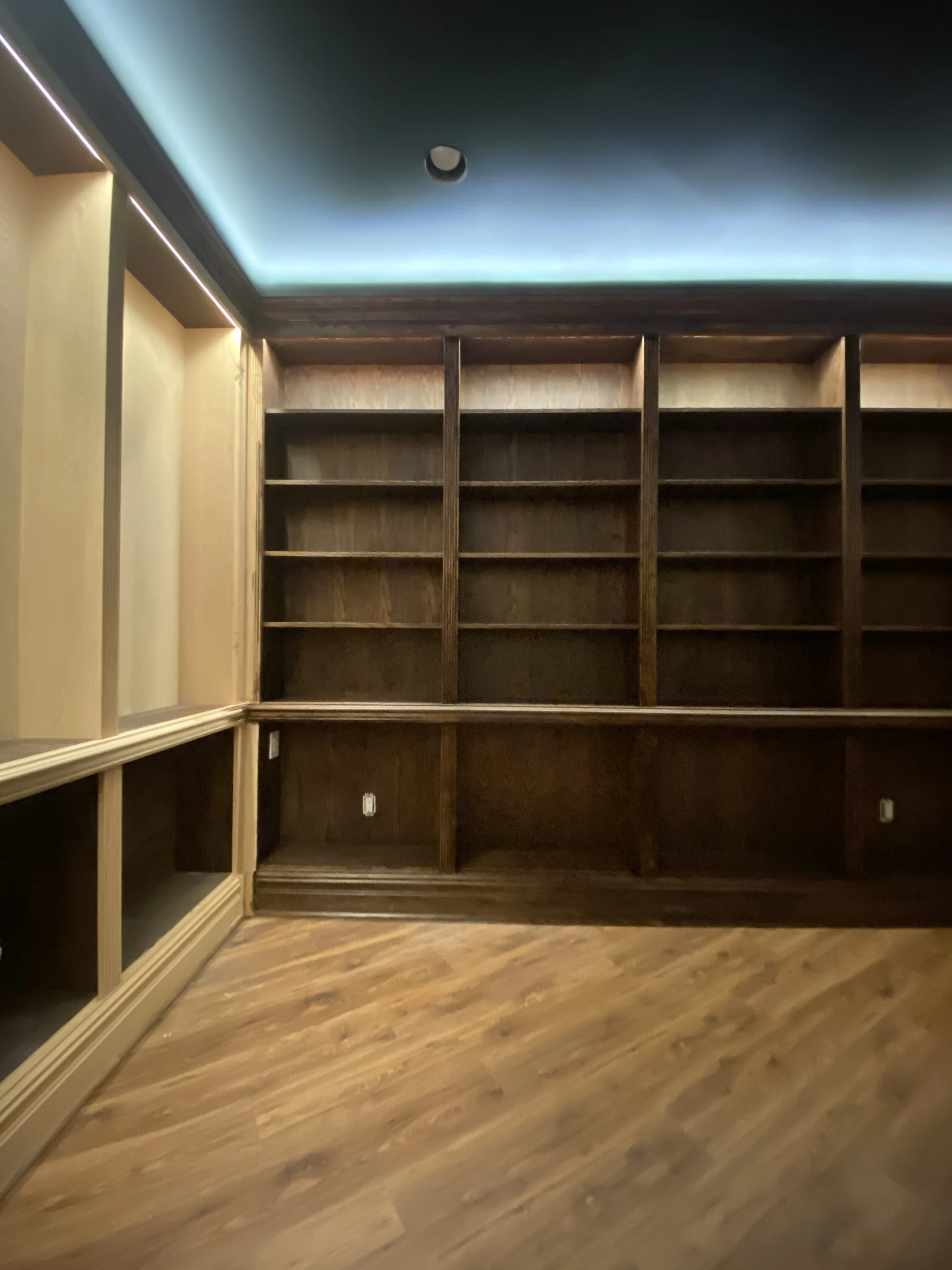 Stained built-in bookshelves, empty