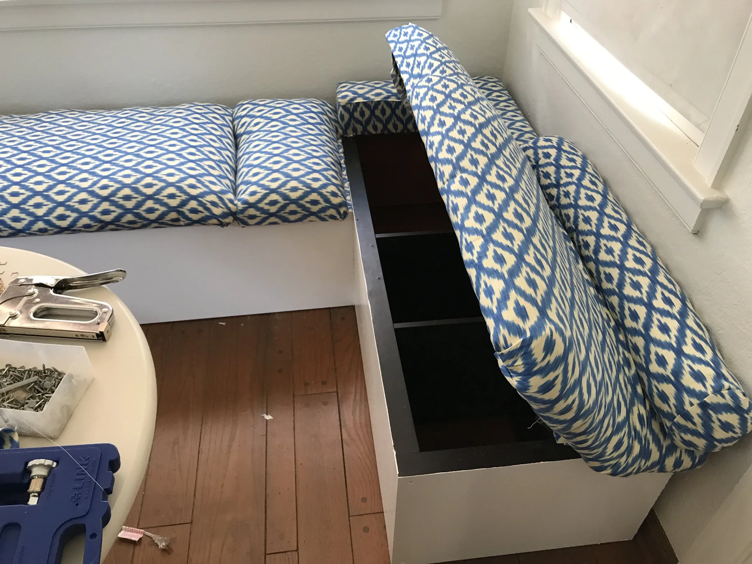 Upholstered window bench with storage