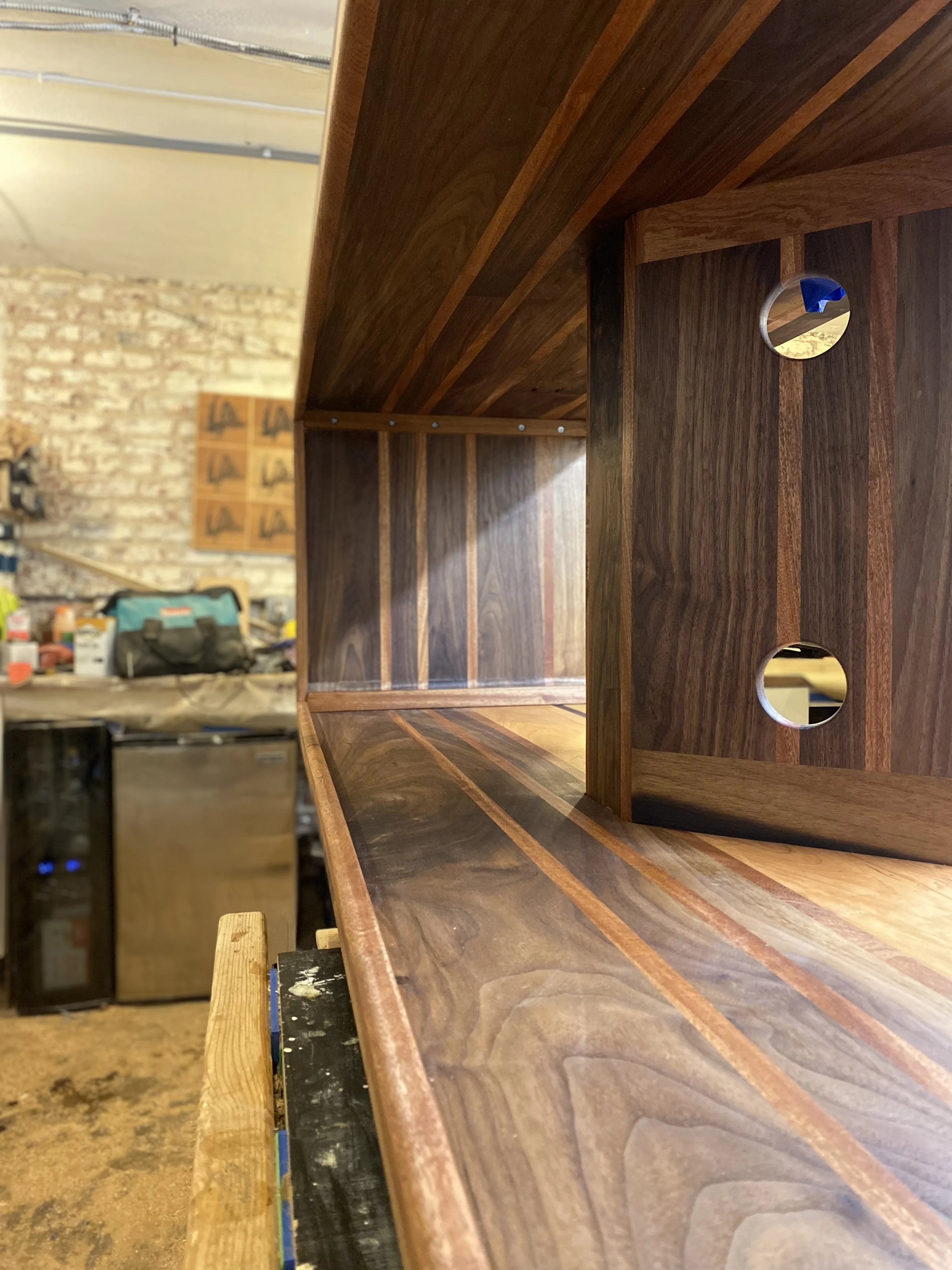 Walnut console in the room