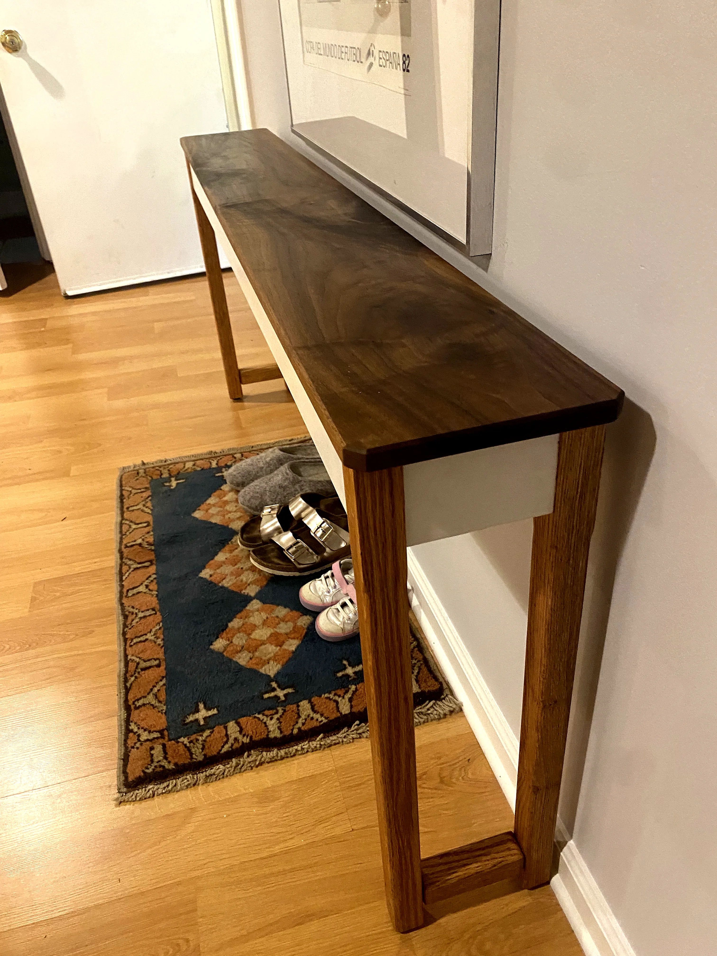 Walnut media console on oak trestle legs, Annapolis residence