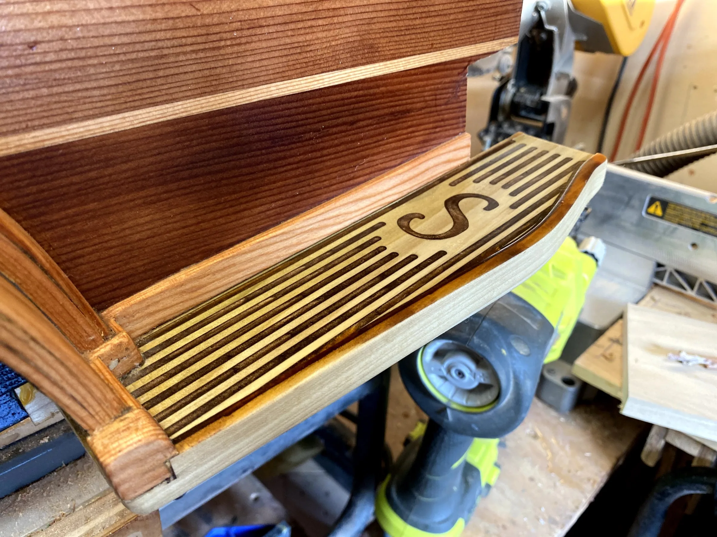 The trailer's step, with an inlaid S